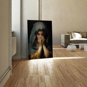 May include: A painting of a woman with her hands covering her face. She is wearing a blue and gold robe and has long dark hair. The background is dark.