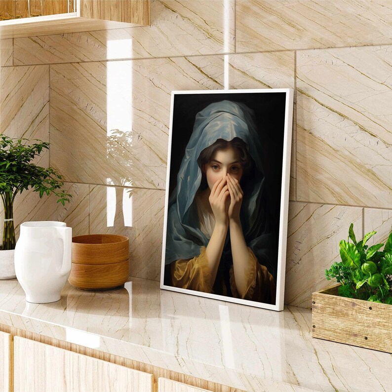 May include: A painting of a woman with her hands covering her face. She is wearing a blue and gold dress and a blue shawl. The painting is framed in a white frame.