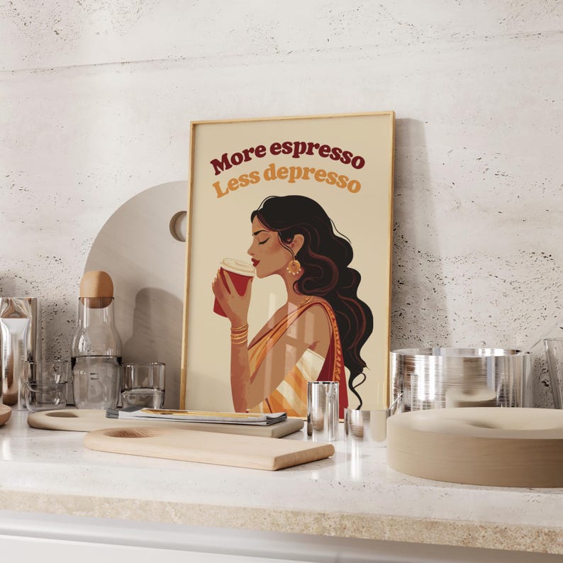 May include: A rectangular wall art print on a cream background featuring an illustration of a person with long dark hair holding a red coffee cup. The text "More espresso Less depresso" is printed in dark red and orange at the top of the print.