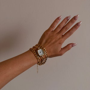 Klockarmband med dubbel guldkedja