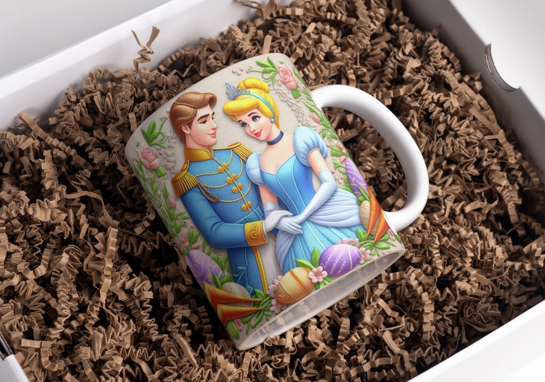May include: A white ceramic mug with a colorful illustration of Prince Charming and Cinderella. The mug features a floral design with pastel-colored Easter eggs.