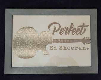 Guitar shaped song lyrics in beautiful 12x18 wood picture frame