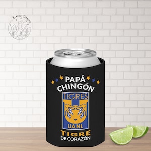 May include: Black can cooler with a white and yellow tiger logo and the text "Papá Chingón Tigres UANL Tigre de Corazón".