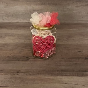 Valentine’s Day hand crafted jar with hearts and red lighting.  Great idea for that special someone!!!