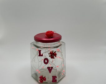 Valentine’s Day hand crafted jar with pearl accents and red firefly lighting.  Great idea for that special someone!!!