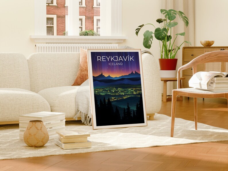 May include: A framed poster featuring a colourful illustration of a city skyline at night. The poster is titled "Reykjavik, Iceland".