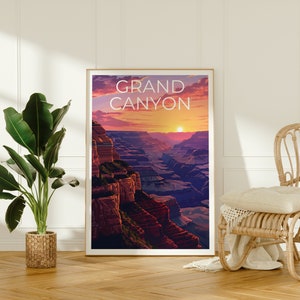 May include: A framed poster with a sunset view of the Grand Canyon. The poster has the text "GRAND CANYON" in white letters.
