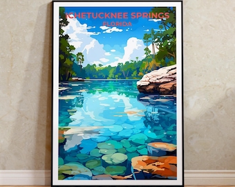 May include: A vintage travel poster featuring a scenic view of Ichetucknee Springs in Florida. The poster depicts a clear blue spring with rocks and trees surrounding it. The text "Ichetucknee Springs Florida" is displayed at the top of the poster.