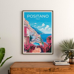 Może przedstawiać: Kolorowy plakat podr&oacute;żniczy z tekstem "Positano, Włochy" w białych literach. Plakat przedstawia żywą ilustrację nadmorskiego miasta z kolorowymi budynkami, basenem i błękitnym oceanem.