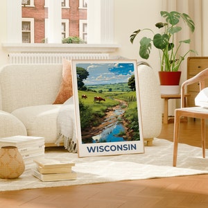 May include: A framed landscape print featuring a vibrant depiction of a Wisconsin countryside scene. The artwork showcases a flowing stream, green fields, and grazing cows under a blue sky. The word "WISCONSIN" is printed at the bottom.