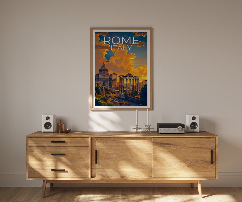 May include: A wooden cabinet with three drawers and two doors. The cabinet is in a room with a white wall and a framed poster of the Roman Forum with the text "ROME ITALY" above the image. There are two speakers and a stereo system on top of the cabinet.