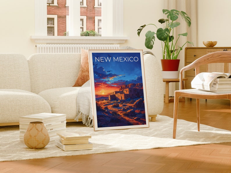 May include: A framed poster with a sunset scene of a pueblo in New Mexico. The poster has the text "NEW MEXICO" at the top.