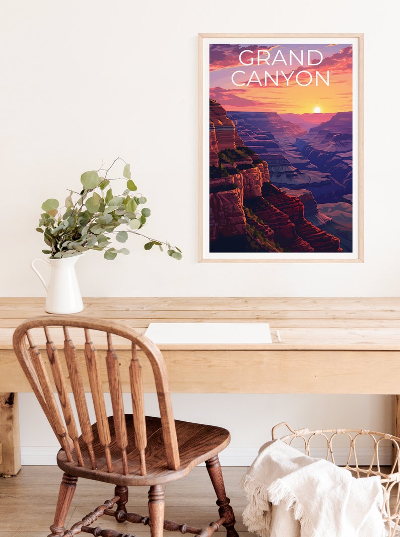 May include: A framed poster with a sunset view of the Grand Canyon. The poster has the text "GRAND CANYON" in white letters on a light brown background.