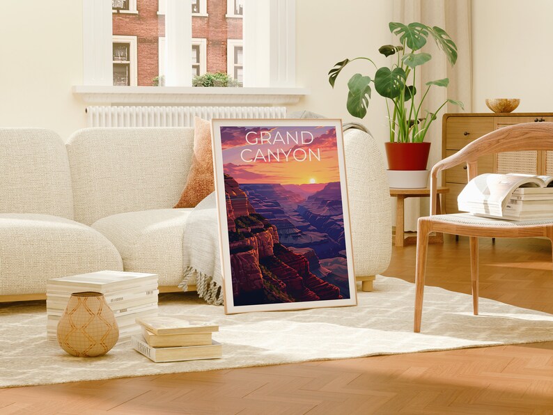 May include: A framed print of the Grand Canyon with a sunset in the background. The print is in a living room setting with a couch, chair, and plants.