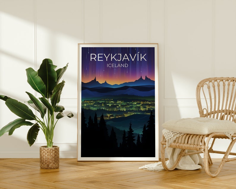 May include: A poster featuring a night-time cityscape of Reykjavik, Iceland. The poster has a dark blue background with a purple and orange gradient sky. The city is illuminated with yellow lights. The text "REYKJAVIK" and "ICELAND" is printed in white at the top of the poster.