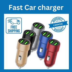 May include: Five car chargers in different colours, each with two USB ports. The chargers are gold, black, silver, blue and red. The text "6 MONTHS WARRANTY" is visible on a white circle with a blue ribbon.