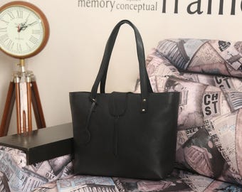 Bolso tote de cuero genuino de lujo premium con interior espacioso, múltiples bolsillos y diseño duradero: perfecto para el trabajo, viajes o uso diario.
