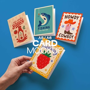 May include: Four greeting cards with various designs are displayed against a blue background. The cards feature illustrations of a tomato sauce bottle, a fish with a fishing hook, a cowboy boot and hat, and a raspberry. The text "A5/A6 CARD MOCKUP" is also visible.