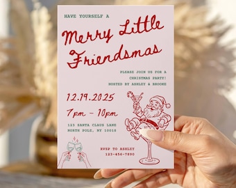 May include: A pink Friendsmas party invitation with red text and illustrations. The invitation includes the text "Merry Little Friendsmas", party details, and a Santa Claus illustration. The invitation is held by a person.