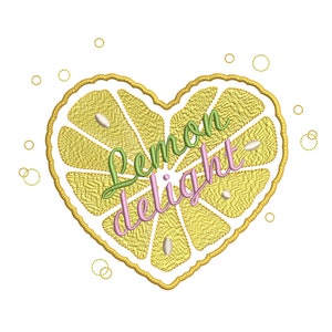 May include: A yellow lemon slice in the shape of a heart with the text "Lemon delight" in green and pink lettering.