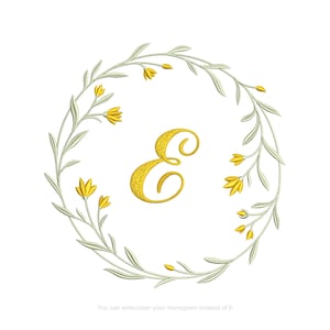 May include: A gold embroidered letter E in a wreath of green leaves and yellow flowers. The text "You can embroider your monogram instead of E" is below the wreath.