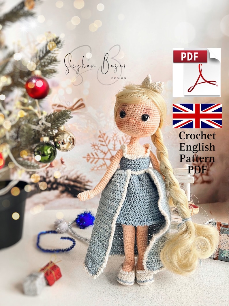 May include: Crochet pattern PDF for a blue and white princess doll with blonde hair and a crown. The pattern is in English and includes a UK flag.