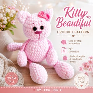 May include: A light pink crocheted cat plush toy with a small bow on its head, large dark eyes, and a dark pink nose. The text reads Kitty Beautiful CROCHET PATTERN, Step-by-step instructions, PDF Download, ABOUT 25 CM TALL, and MADE WITH LOVE.