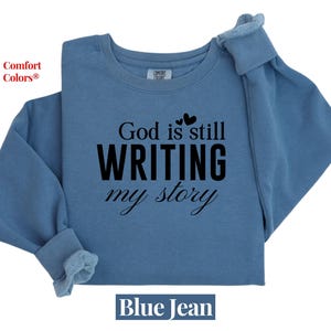 God is Still Writing My Story Sweatshirt - Comfort Colors Christian Apparel