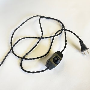 May include: Black electrical cord with a black inline on/off switch and a standard US plug.