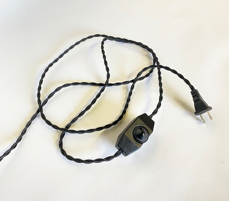 May include: Black electrical cord with a black inline on/off switch and a standard US plug.