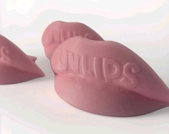 Relleno de labios bronceador UVLips, protección UV para cama solar