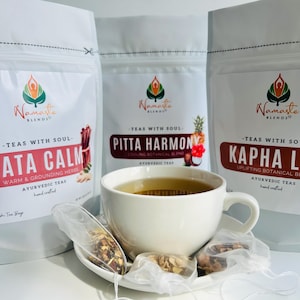 Herbal tea bags packaging with digestion balance blend, natural botanical tea bags, caffeine free herbal tea for daily ritual, cozy tea gift for self care and mindful tea moments