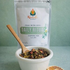 Herbal tea bags packaging with digestion balance blend, natural botanical tea bags, caffeine free herbal tea for daily ritual, cozy tea gift for self care and mindful tea moments