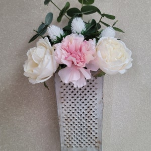 Faux flower arrangement, artificial flowers, tabletop flower arrangement, repurposed cheese grater.