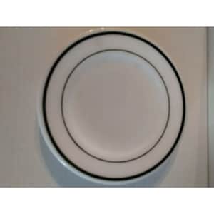 May include: A white ceramic plate with a black rim. The plate has a smaller black rim inside the larger rim.