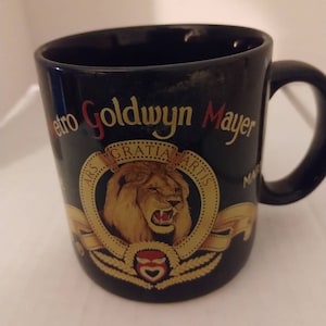 MGM Metro Goldwyn Mayer Black Coffee Mug Lion Logo Dakin VINTAGE