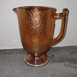 Jeanette Iridescent Marigold Crackle Carnival Glass Water Pitcher