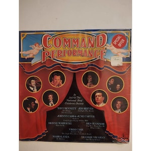 May include: A vintage vinyl record album titled "Command Performance" with a red and blue design. The album cover features images of various performers and the text "Special Offer". The album is in aid of the National Deaf Children's Society.