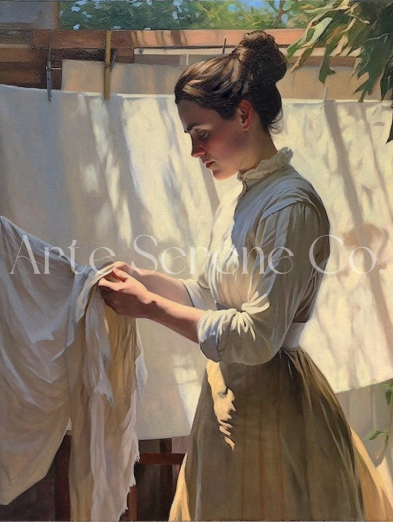 May include: A woman in a white blouse and a long brown skirt is hanging laundry on a clothesline. The laundry is white and the woman is looking down at the clothes. The scene is lit by sunlight streaming through a window.