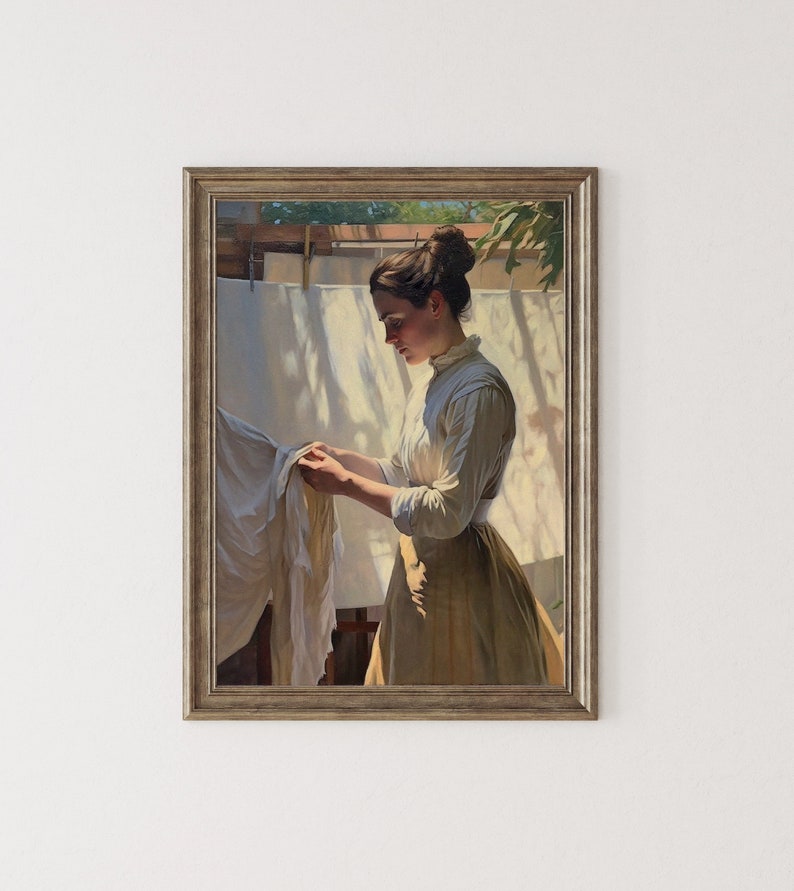 May include: A painting of a woman in a white blouse and a long brown skirt, standing in a sunlit room, holding a white sheet. The sheet is hanging on a clothesline in the background.