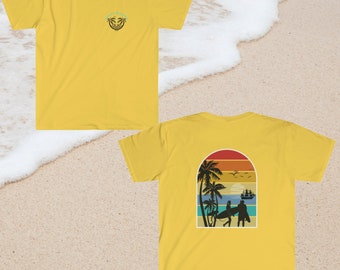 May include: Yellow t-shirt with a palm tree and wave design on the front and a retro sunset scene with palm trees and surfers on the back.