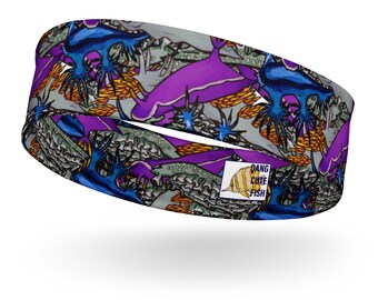 May include: A purple, blue, and yellow headband with a repeating pattern of sea slugs and the text "Dang Cute Fish".