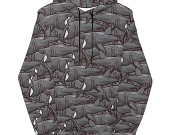 May include: A gray hoodie with a repeating pattern of cartoon frilled shark illustrations.
