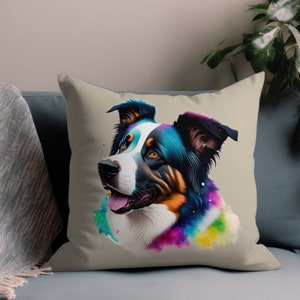 May include: A colorful pillow featuring a close-up portrait of a dog with blue, black, and white fur. The dog's fur is painted with rainbow colors and the background is a watercolor wash of blue, green, and yellow.