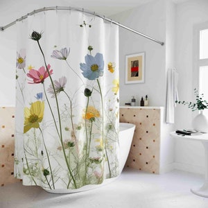 May include: White shower curtain with a floral print featuring colourful cosmos flowers on a white background.