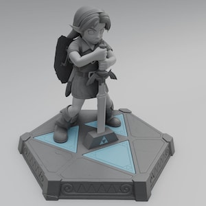 May include: A gray figurine of Link from The Legend of Zelda video game series, holding a sword and shield. The figurine is standing on a gray hexagonal base with a blue triangular design.