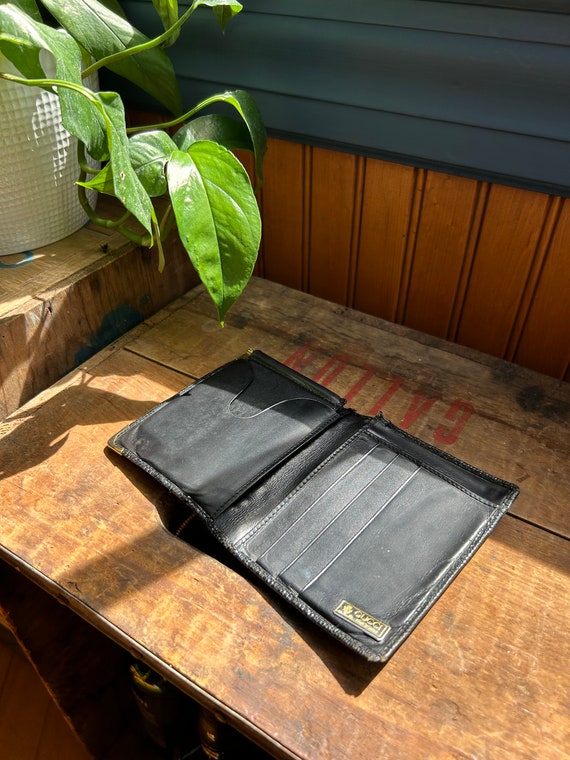 Vintage Gucci men's leather bifold wallet with money… Gem
