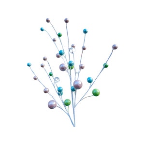 May include: A silver twig spray with pink, blue and green glass baubles. The baubles are arranged in a random pattern on the twig spray.