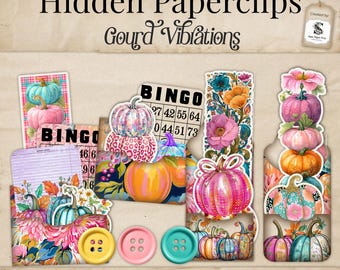 Op de afbeelding: Een verzameling bedrukbare paperclips met een herfstthema, met verschillende pompoenontwerpen, bingokaarten en bloemaccenten. De tekst luidt "Hidden Paperclips Gourd Vibrations". Bevat drie knoppen in geel, roze en turquoise.