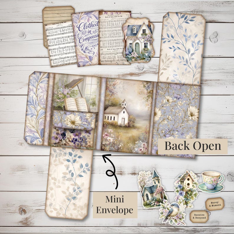 May include: A collection of paper ephemera with a vintage aesthetic. Includes a mini envelope, tags, and a multi-panel piece with floral and church illustrations. The color palette features soft blues, purples, and creams, with text that reads "Clothed in Compassion" and "Back Open".